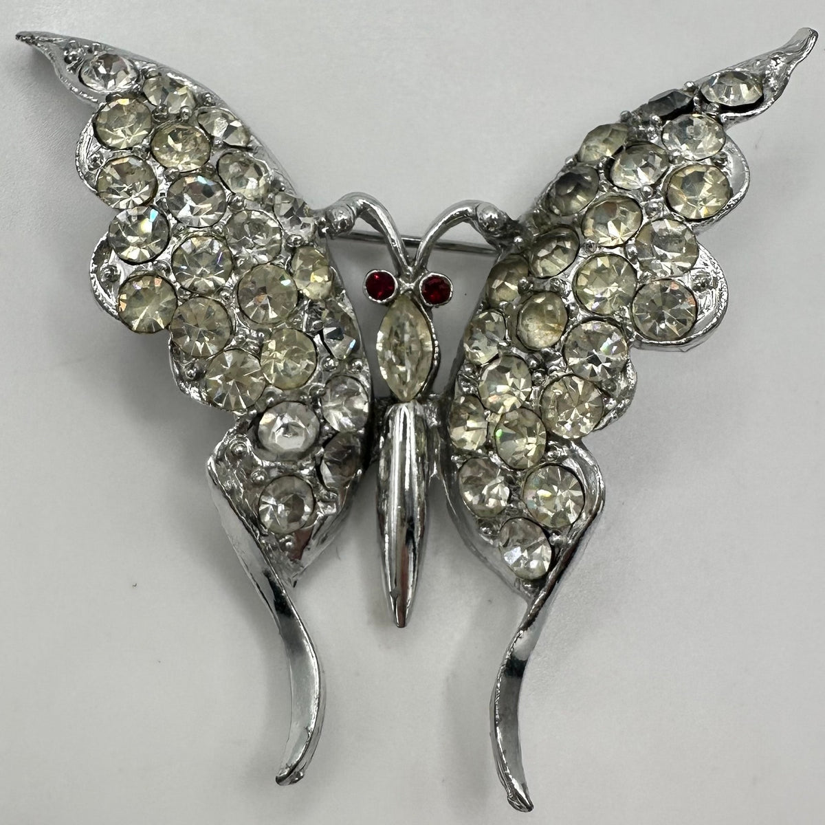 Vintage 1940s silver tone rhodium plated clear red rhinestones butterfly brooch