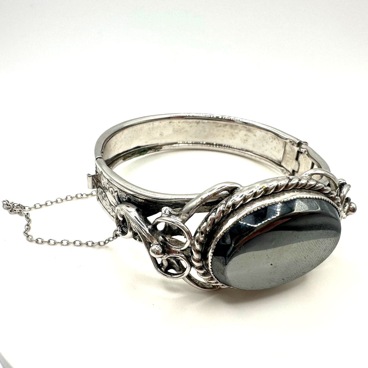 Vintage Victorian Revival silver tone hematite glass hinged bangle bracelet