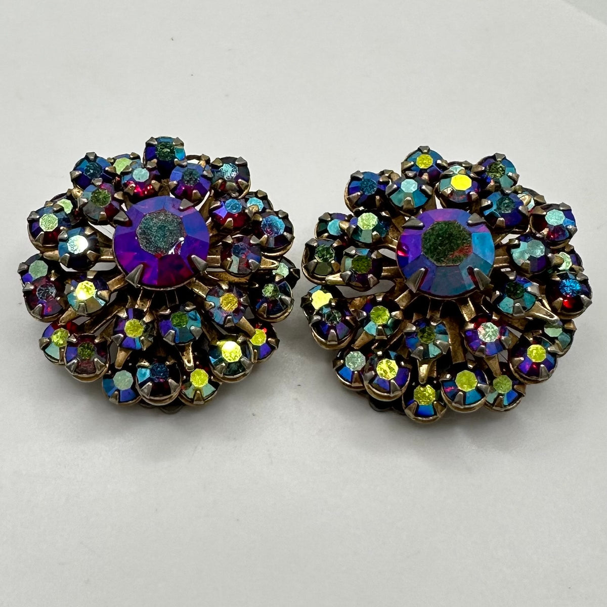Vintage 1950s gold tone red aurora borealis AB rhinestones clip on earrings