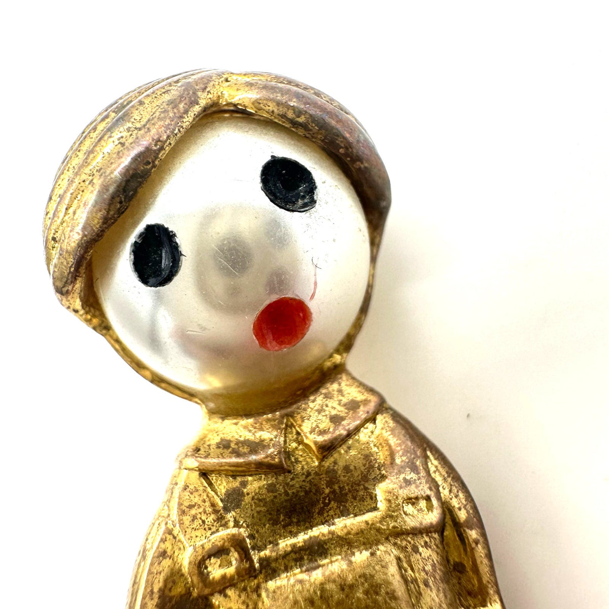 Vintage gold tone boy child with sailboat faux pearl articulated figural brooch