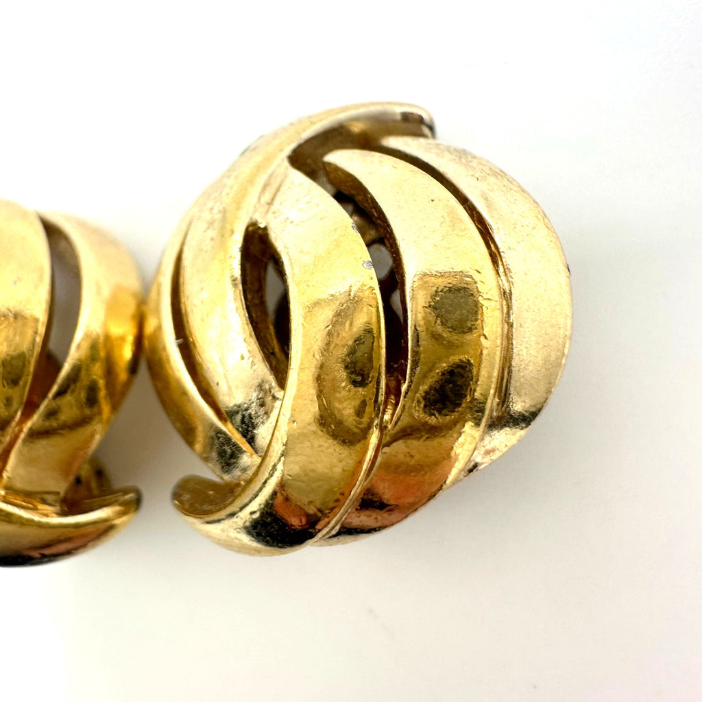Panetta signed vintage signed gold tone domed abstract leaf clip on earrings