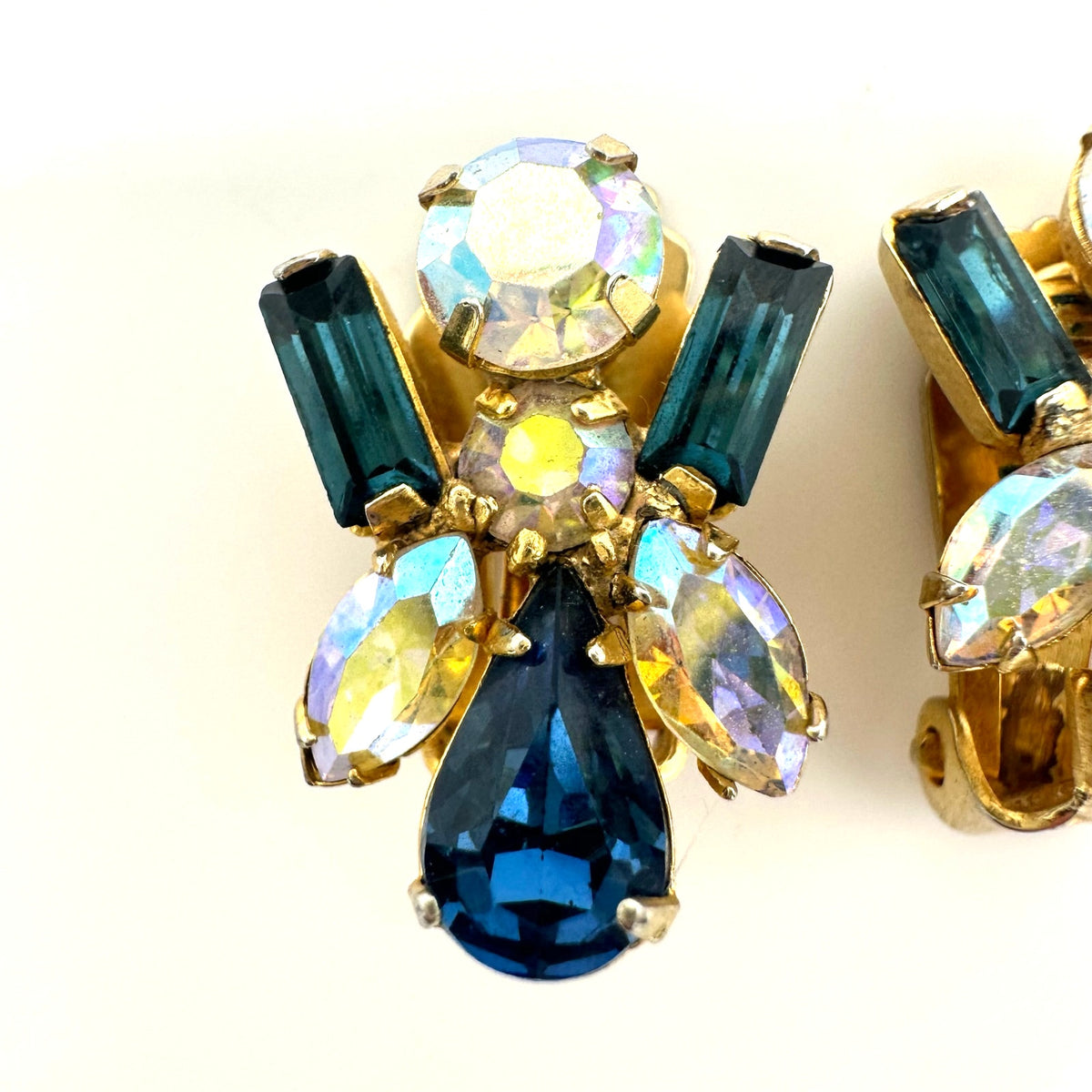 Vintage 1950s gold tone blue aurora borealis AB rhinestones clip on earrings