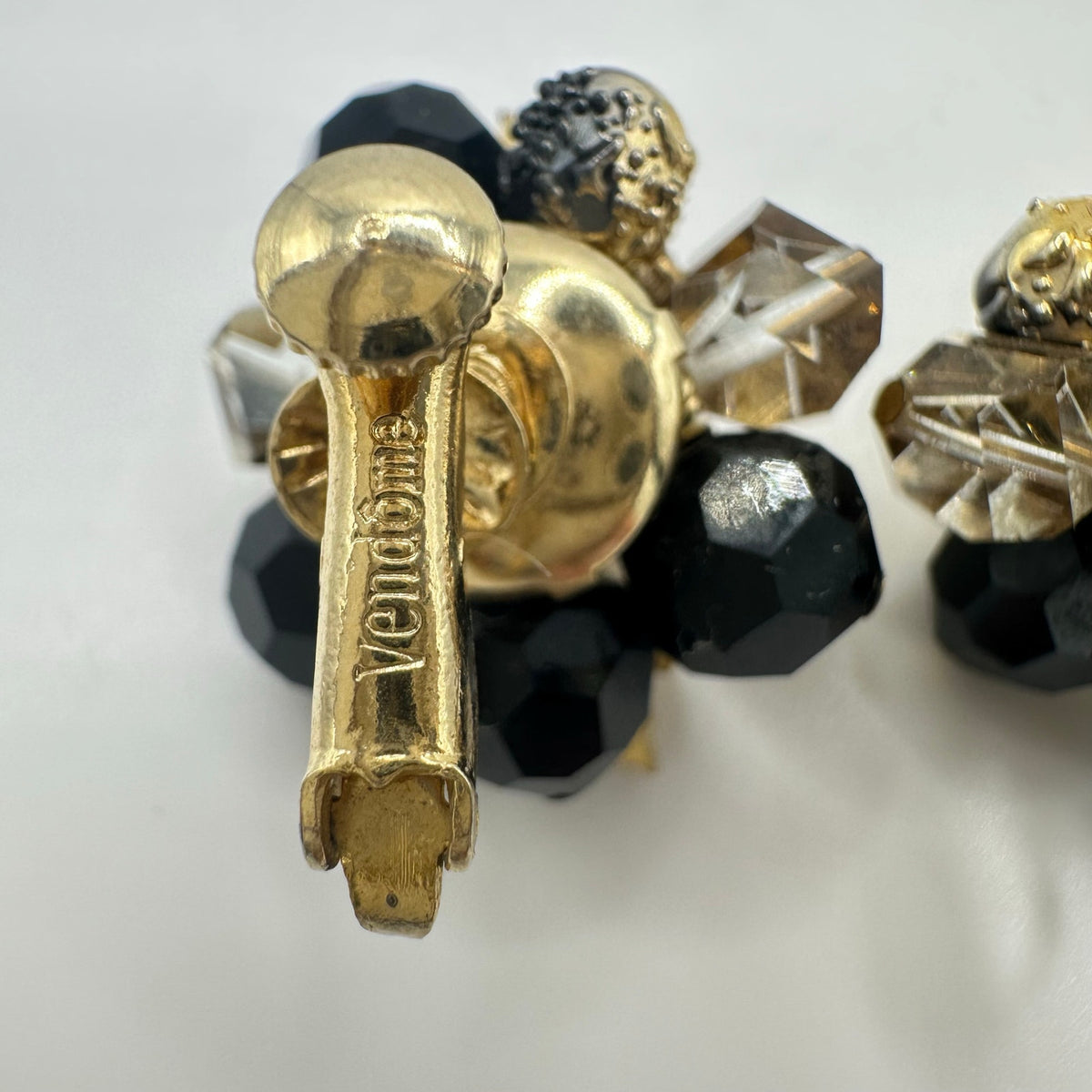 Vendome gold tone leaves black glass beads beaded cluster clip on earrings