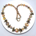 Vintage light topaz faceted glass aurora borealis AB beaded 15.5” necklace