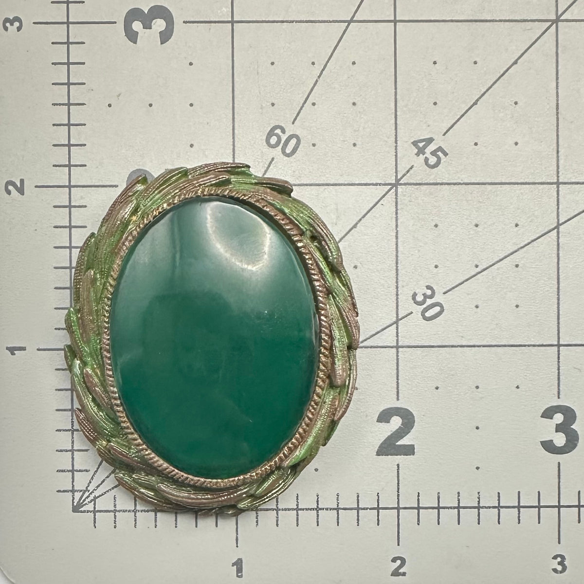 Vintage gold tone emerald green glass cabochon Victorian Revival brooch pendant