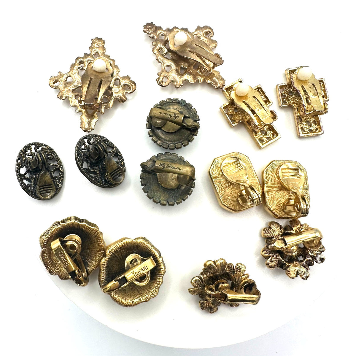 Bundle jewelry lot 7 pairs vintage gold tone clip on earrings 1928 Trifari Monet