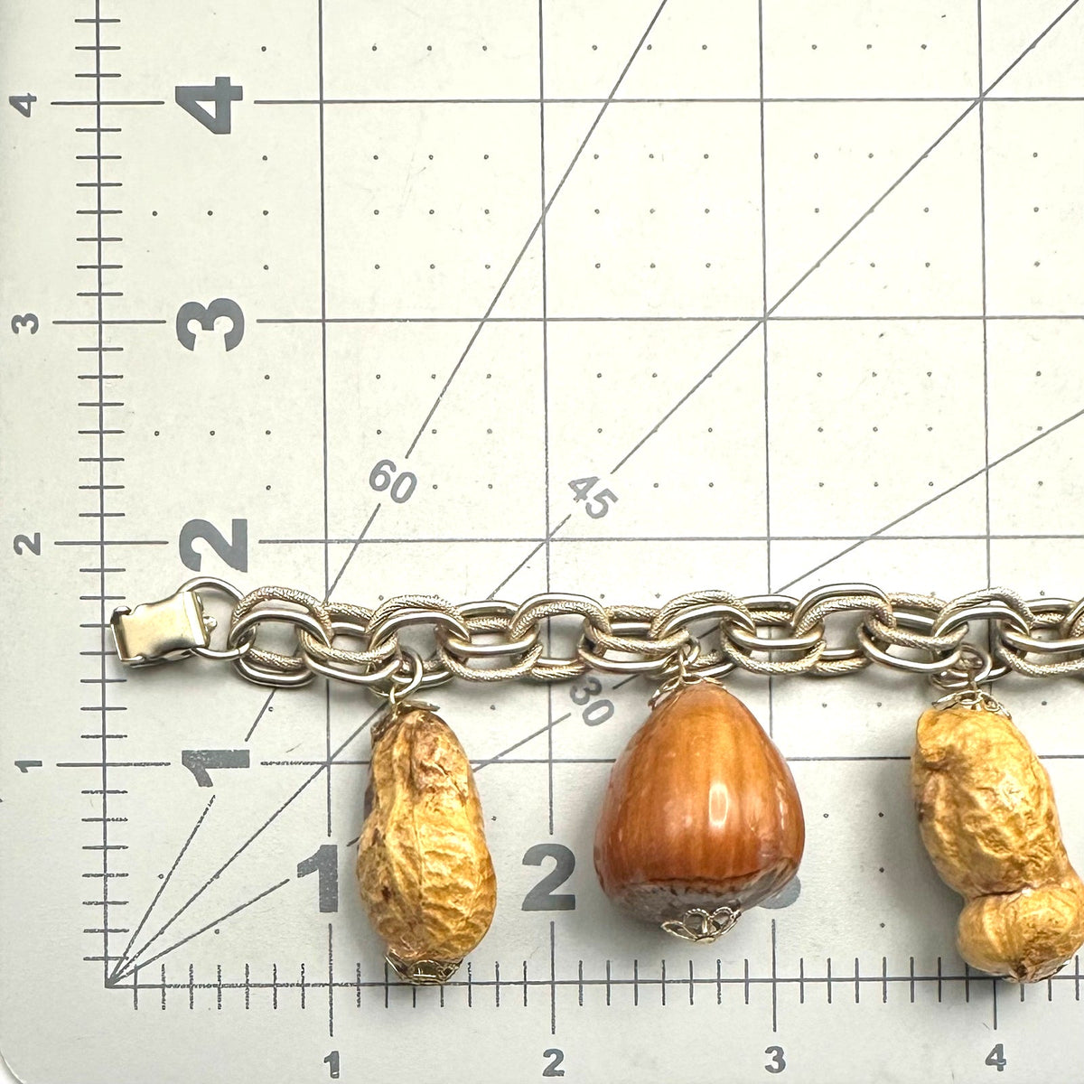 Vintage gold tone real peanuts chestnuts chunky statement chain charms bracelet