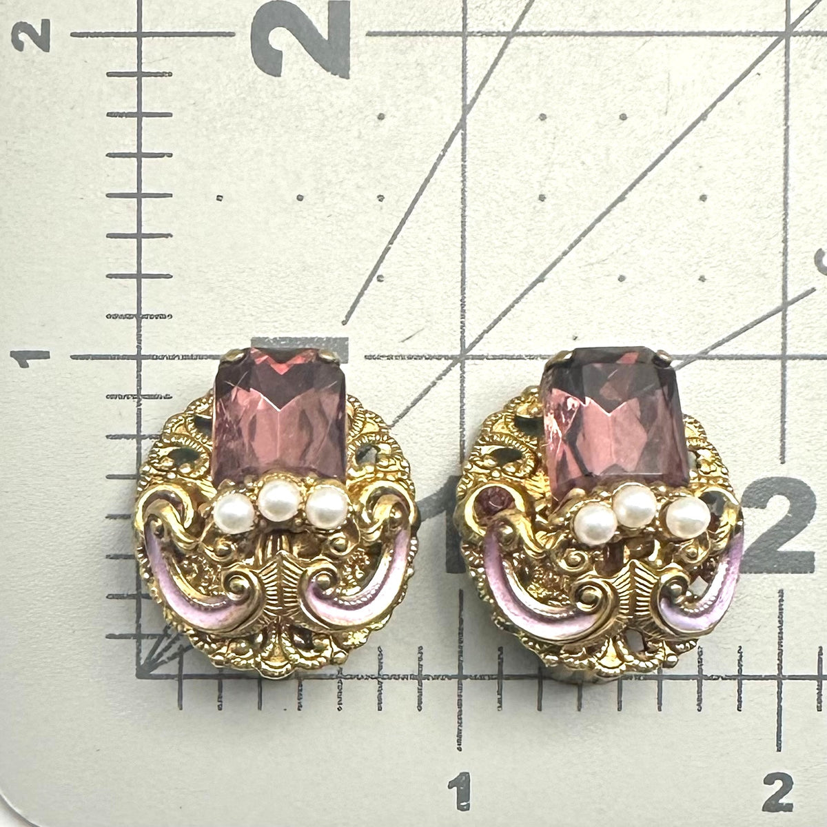West Germany vintage gold tone filigree purple rhinestones clip on earrings