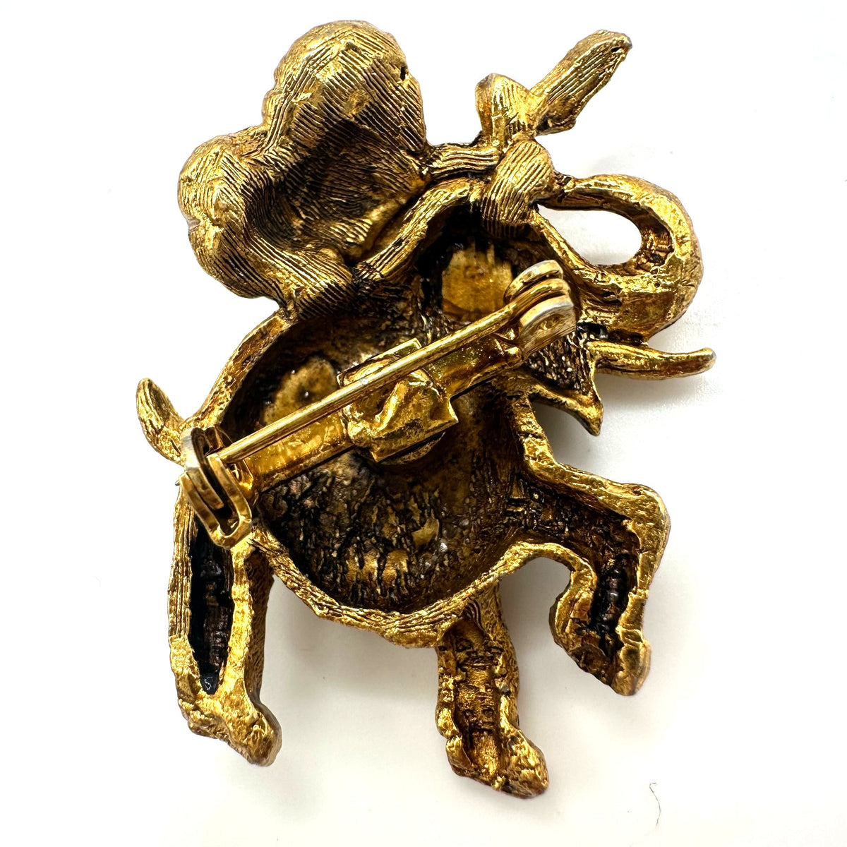 Vintage gold tone multicolor rhinestones elephant flowers figural brooch