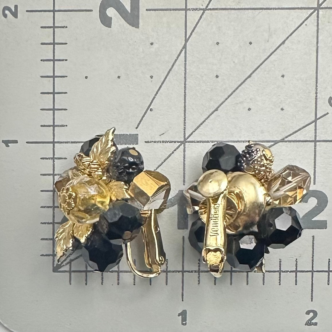 Vendome gold tone leaves black glass beads beaded cluster clip on earrings
