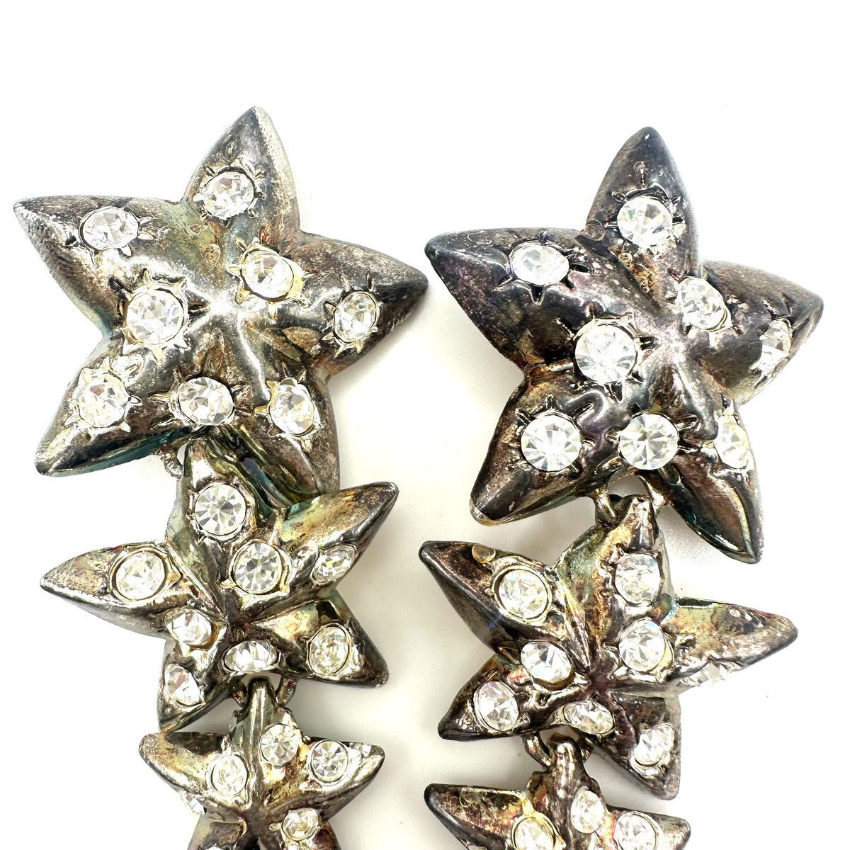 Vintage 1990s silver tone clear rhinestones 3 stars dangle drop clip on earrings