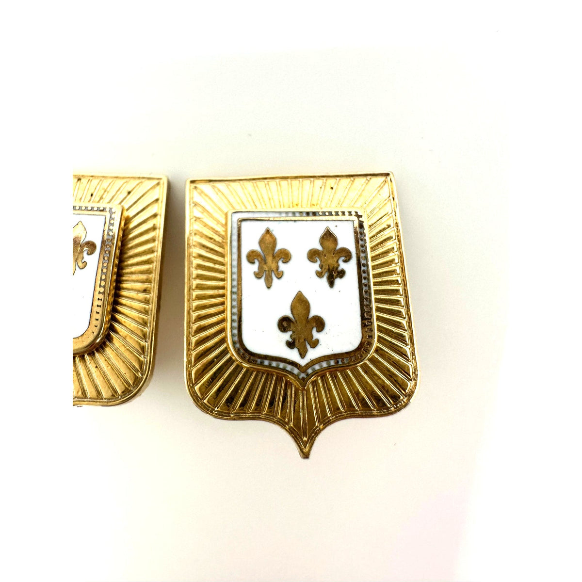 Vintage gold tone white enamel Heraldic shield fleur de lis clip on earrings