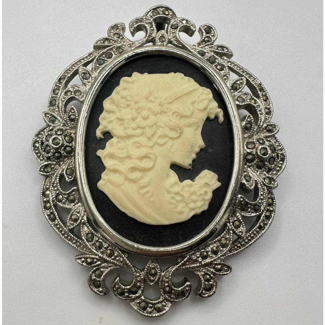Silver tone rhodium plated genuine marcasite black white cameo brooch pendant