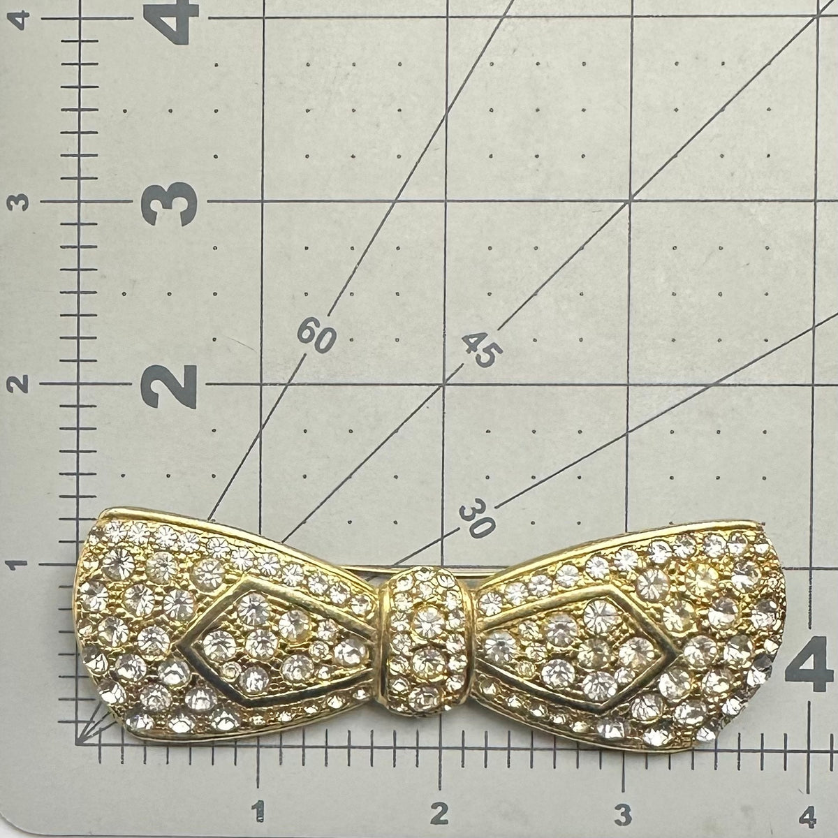 Vintage gold tone large oversized massive heavy clear rhinestones bow brooch