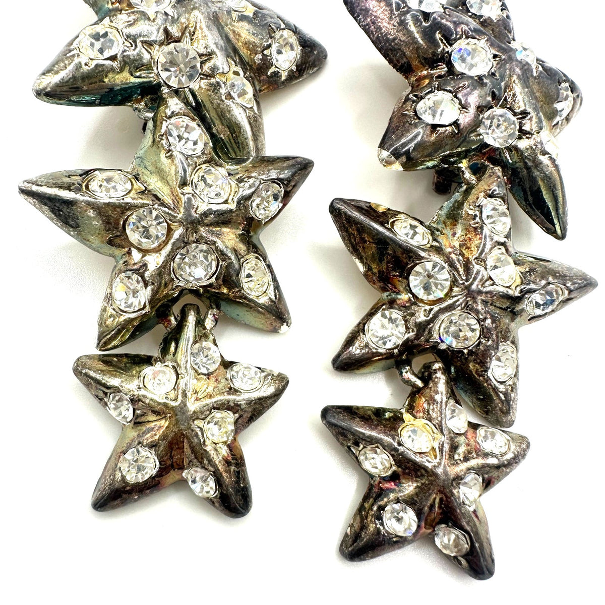 Vintage 1990s silver tone clear rhinestones 3 stars dangle drop clip on earrings