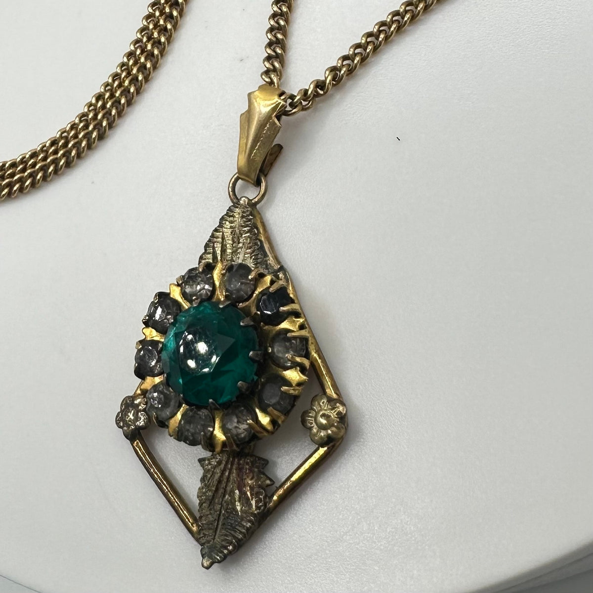 Vintage 12kt gold filled green rhinestones pendant on Lang 21” chain necklace