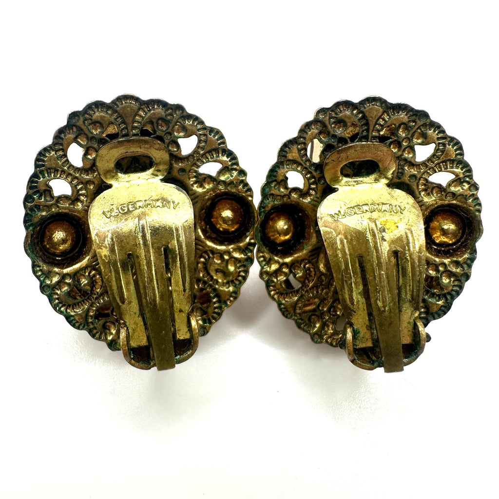 West Germany vintage gold tone filigree purple rhinestones clip on earrings