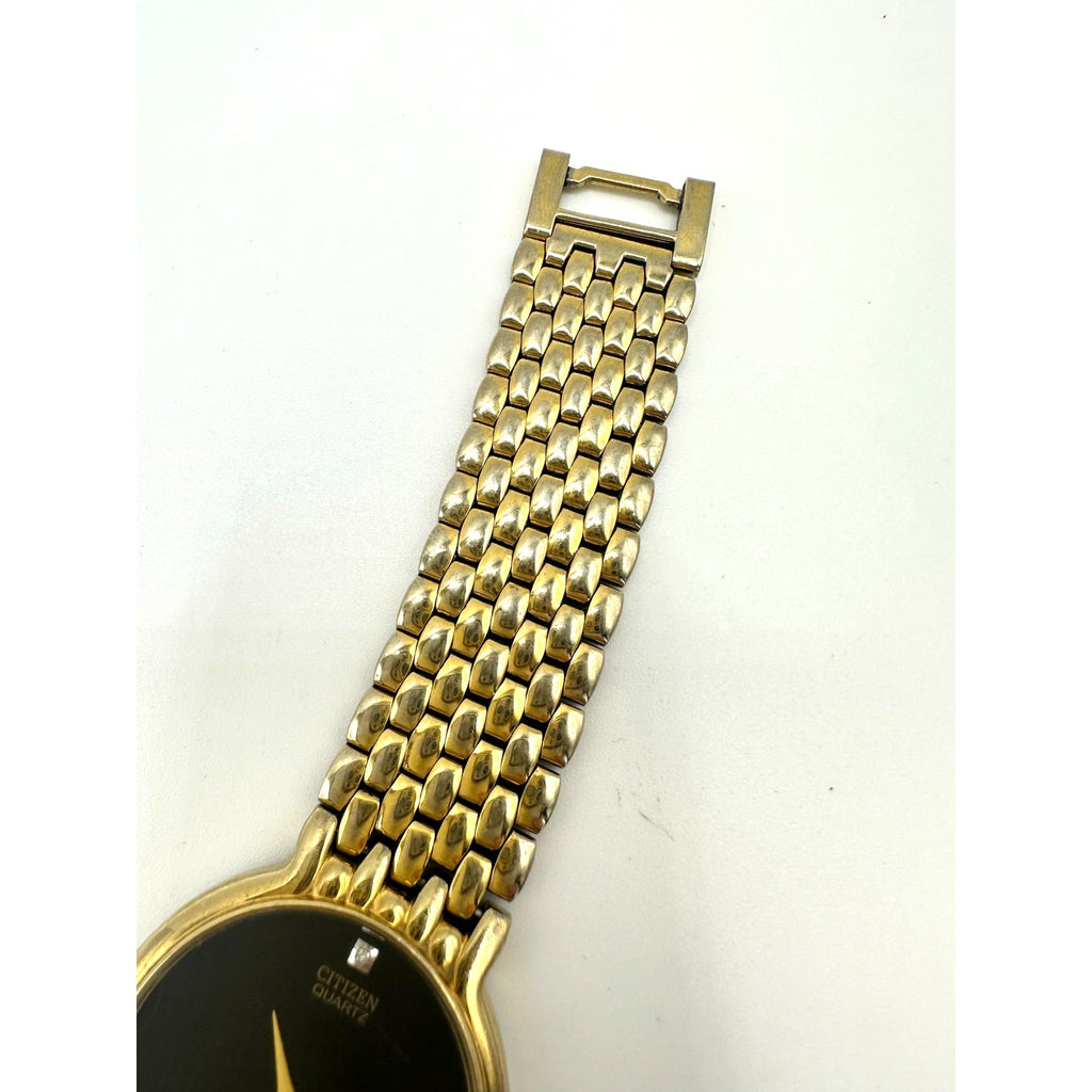 Citizen vintage 1020-954562 Quartz gold black round dial stainless steel watch