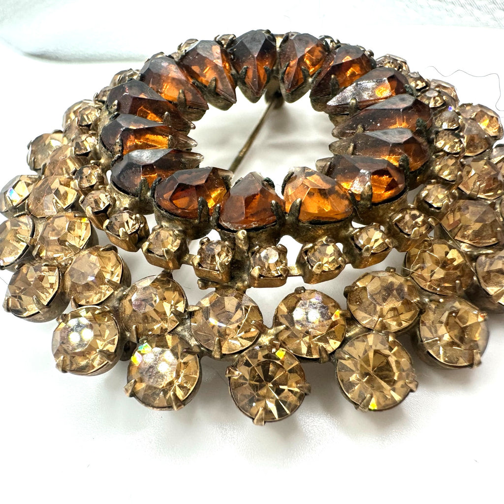 Vintage gold tone amber topaz glass rhinestones round circular wreath brooch