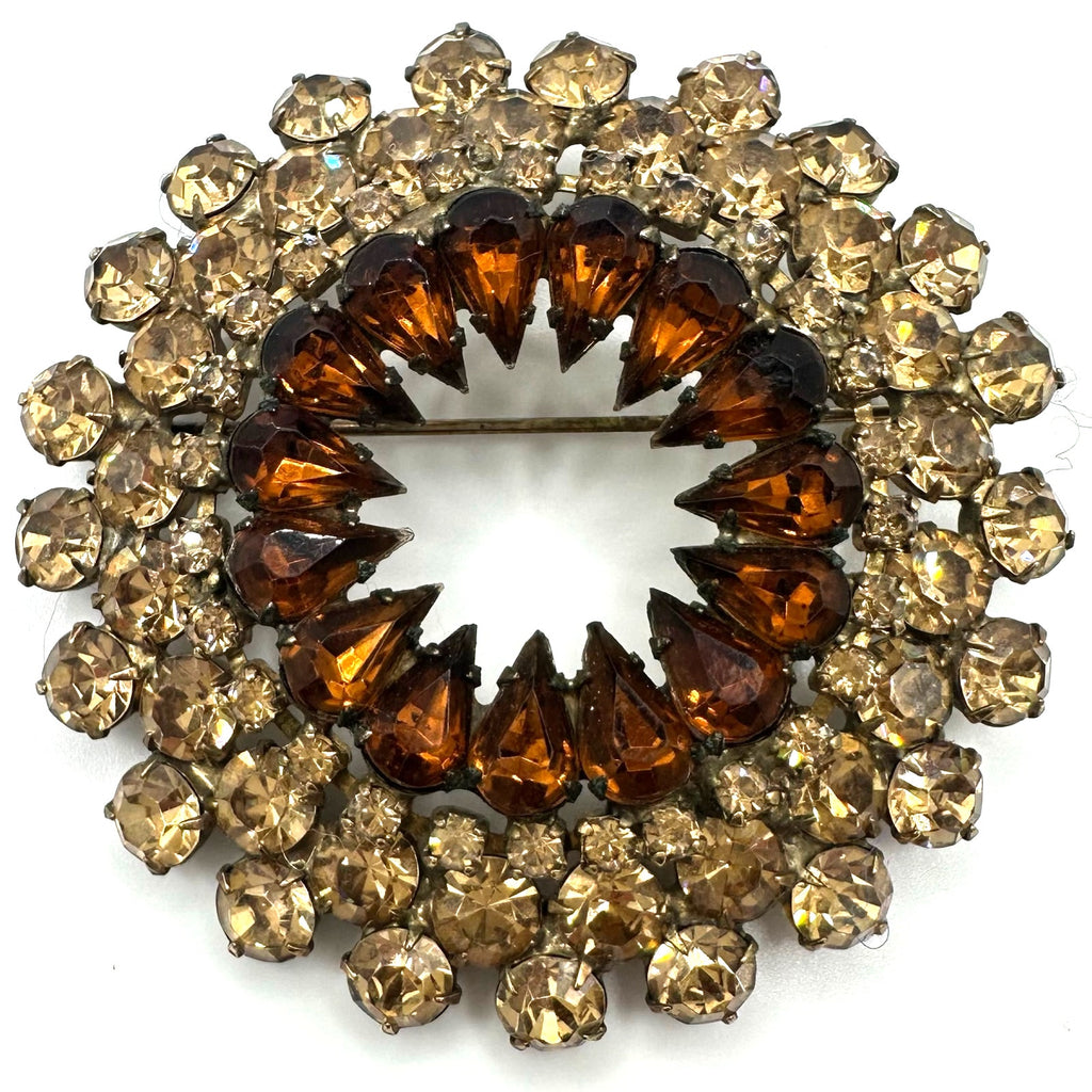 Vintage gold tone amber topaz glass rhinestones round circular wreath brooch