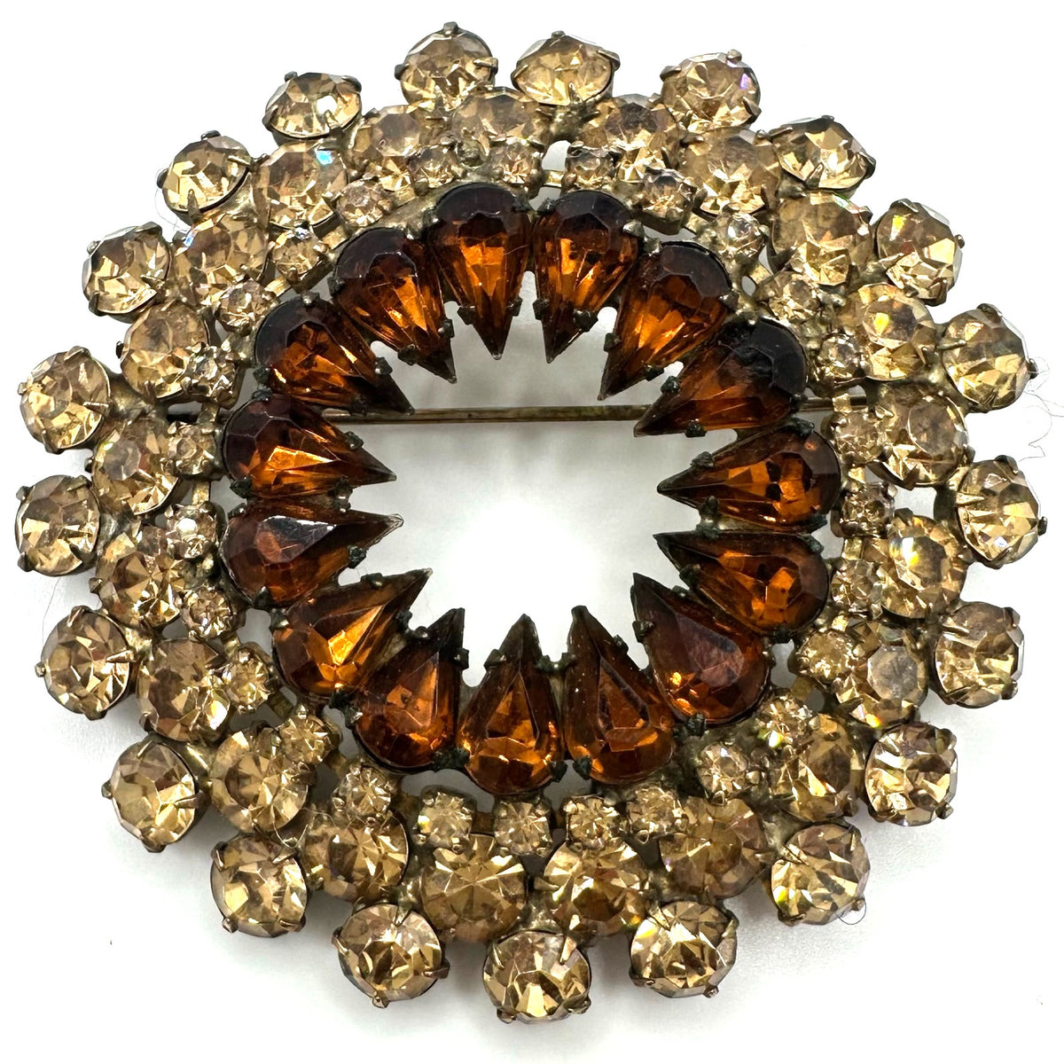 Vintage gold tone amber topaz glass rhinestones round circular wreath brooch