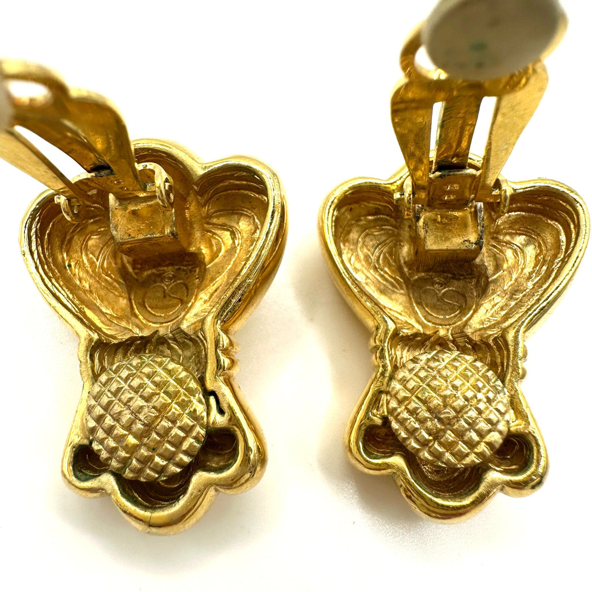 St. John signed 1980s 1990s vintage gold plated heavy abstract clip on earrings