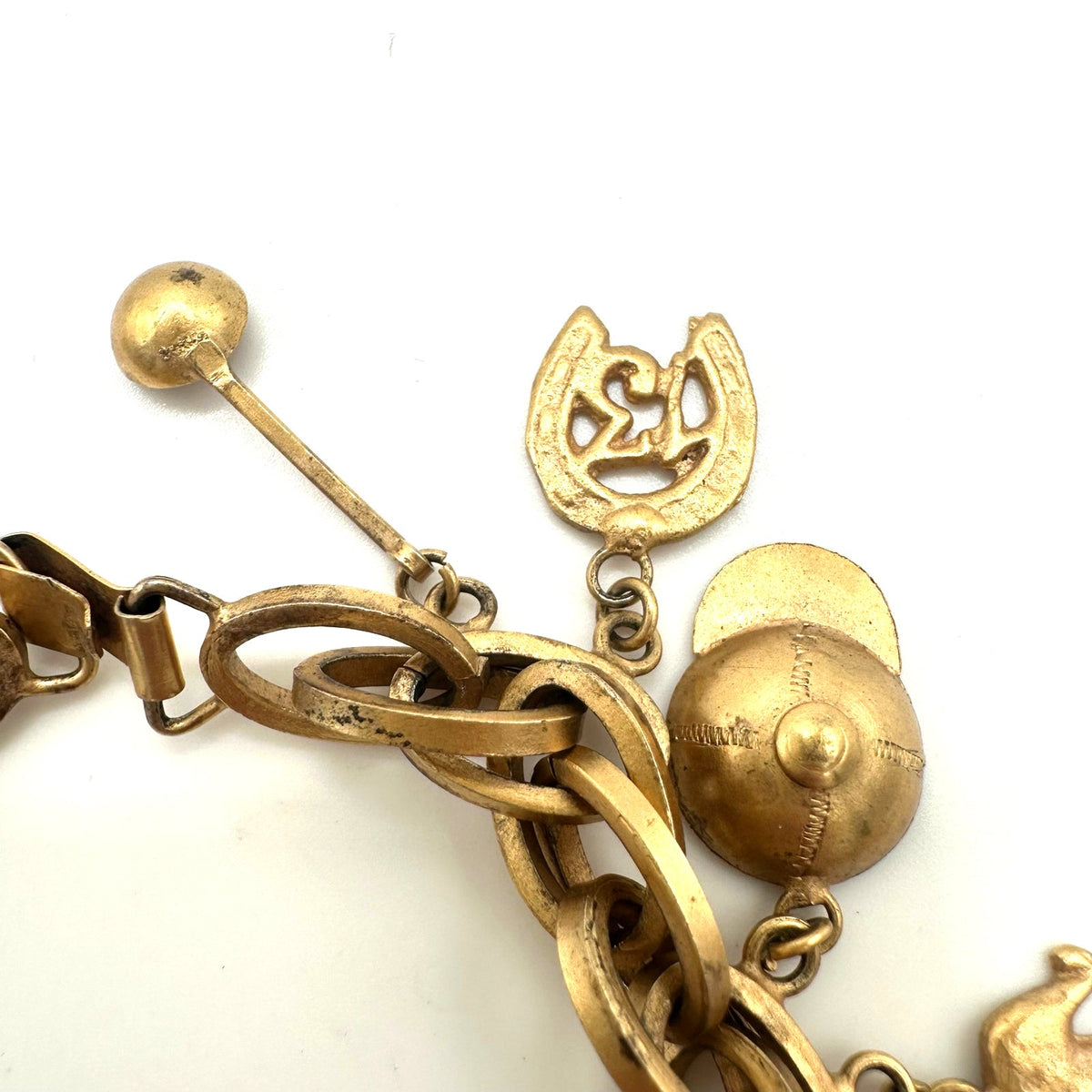 Vintage Made in Mexico midcentury gold tone 16 charms chain bracelet 7.5"