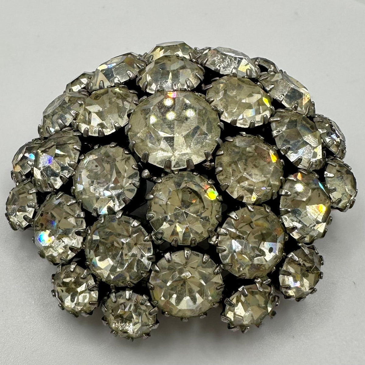 1950s vintage silver tone clear rhinestones sawtooth prong round domed 3D brooch