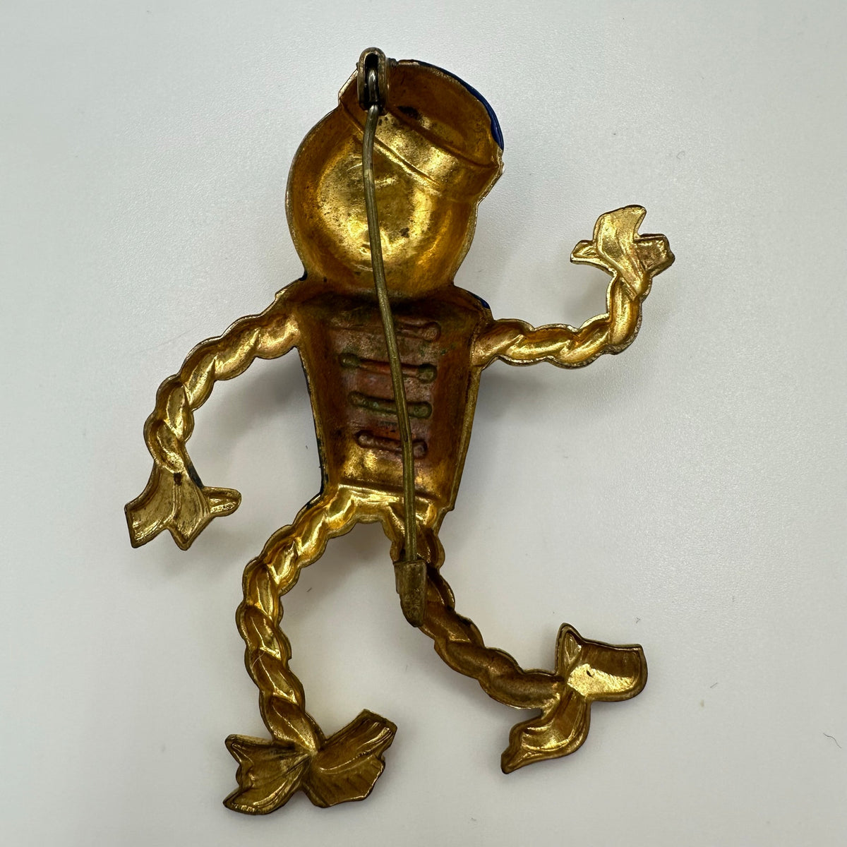 Antique Art Deco 1930s enamel brass boy bellhop Figural rope brooch pin
