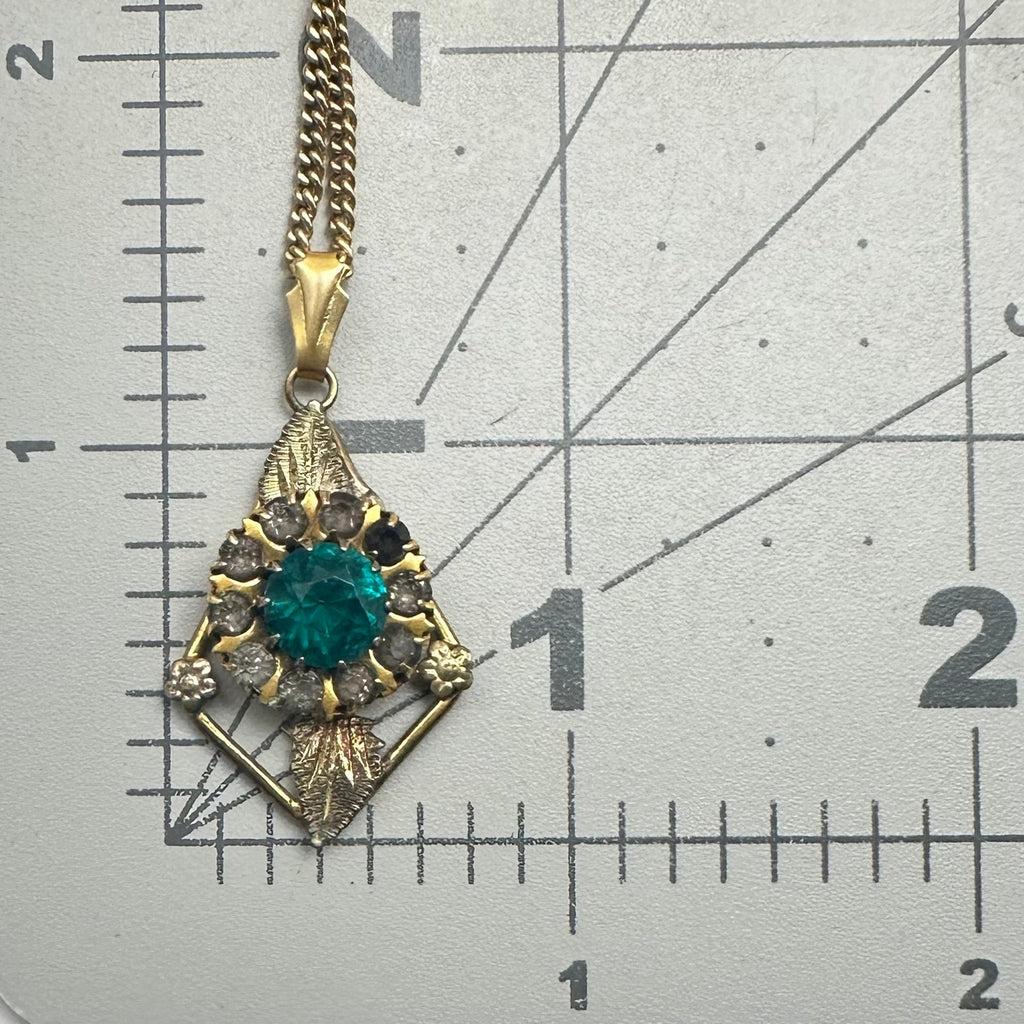 Vintage 12kt gold filled green rhinestones pendant on Lang 21” chain necklace