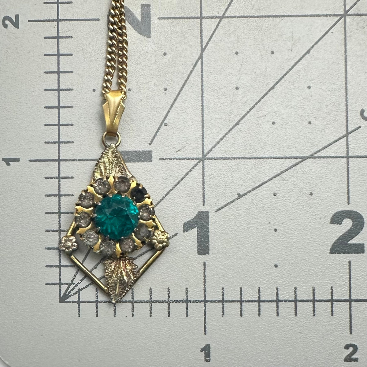 Vintage 12kt gold filled green rhinestones pendant on Lang 21” chain necklace