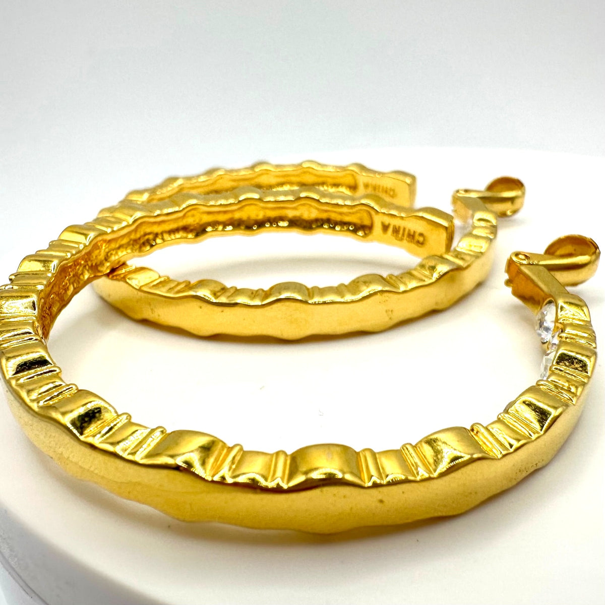 China signed gold tone clear rhinestones chunky hoops statement clip on earrings