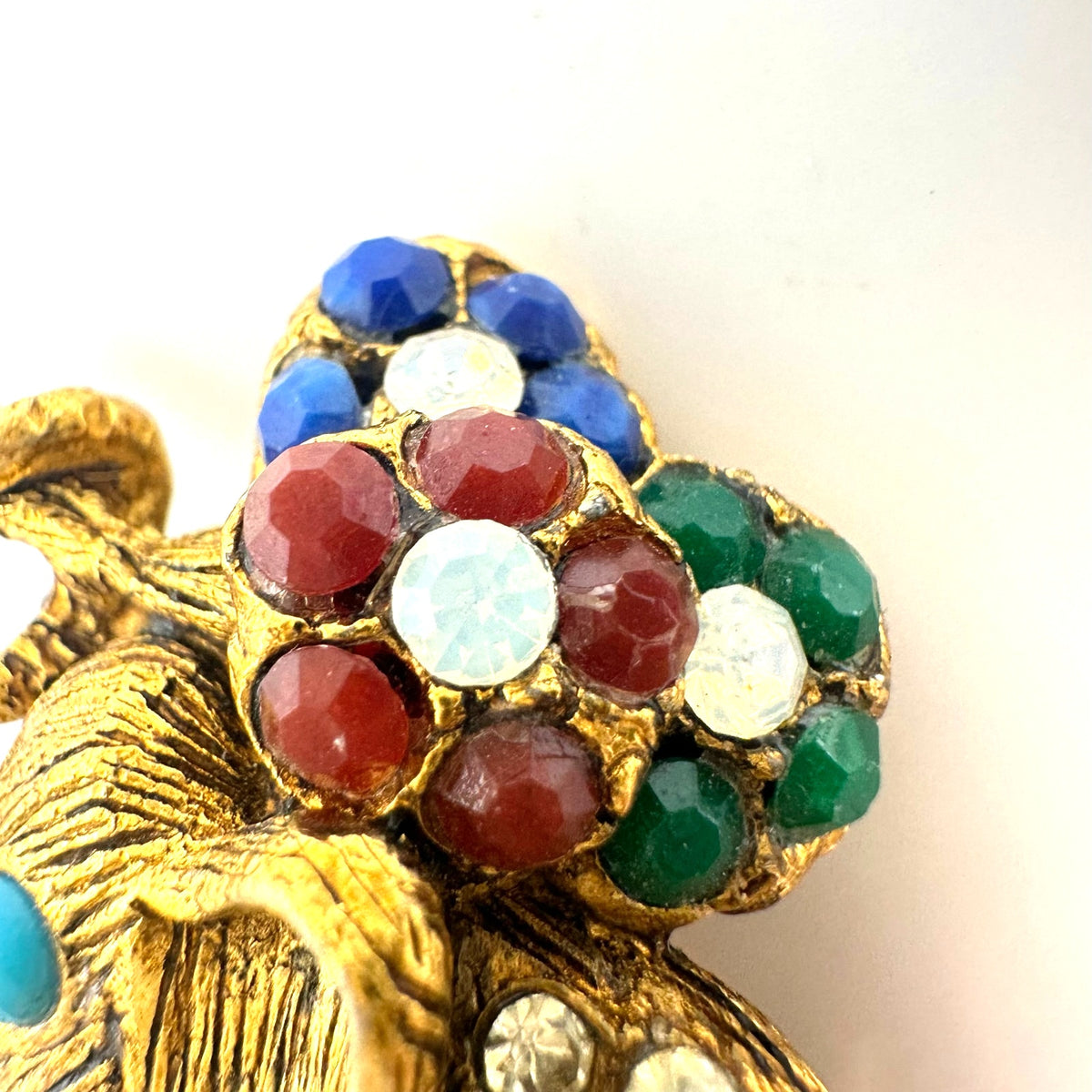 Vintage gold tone multicolor rhinestones elephant flowers figural brooch