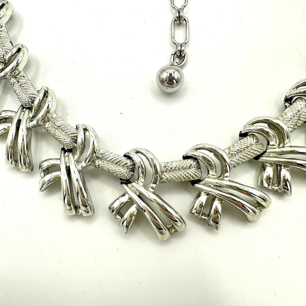 Kramer signed vintage silver tone rhodium plated bows ribbons chain 16” necklace
