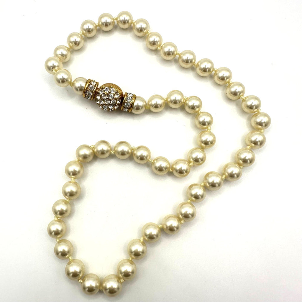 Nolan Miller gold tone white 8mm glass faux pearls rhinestones knotted necklace
