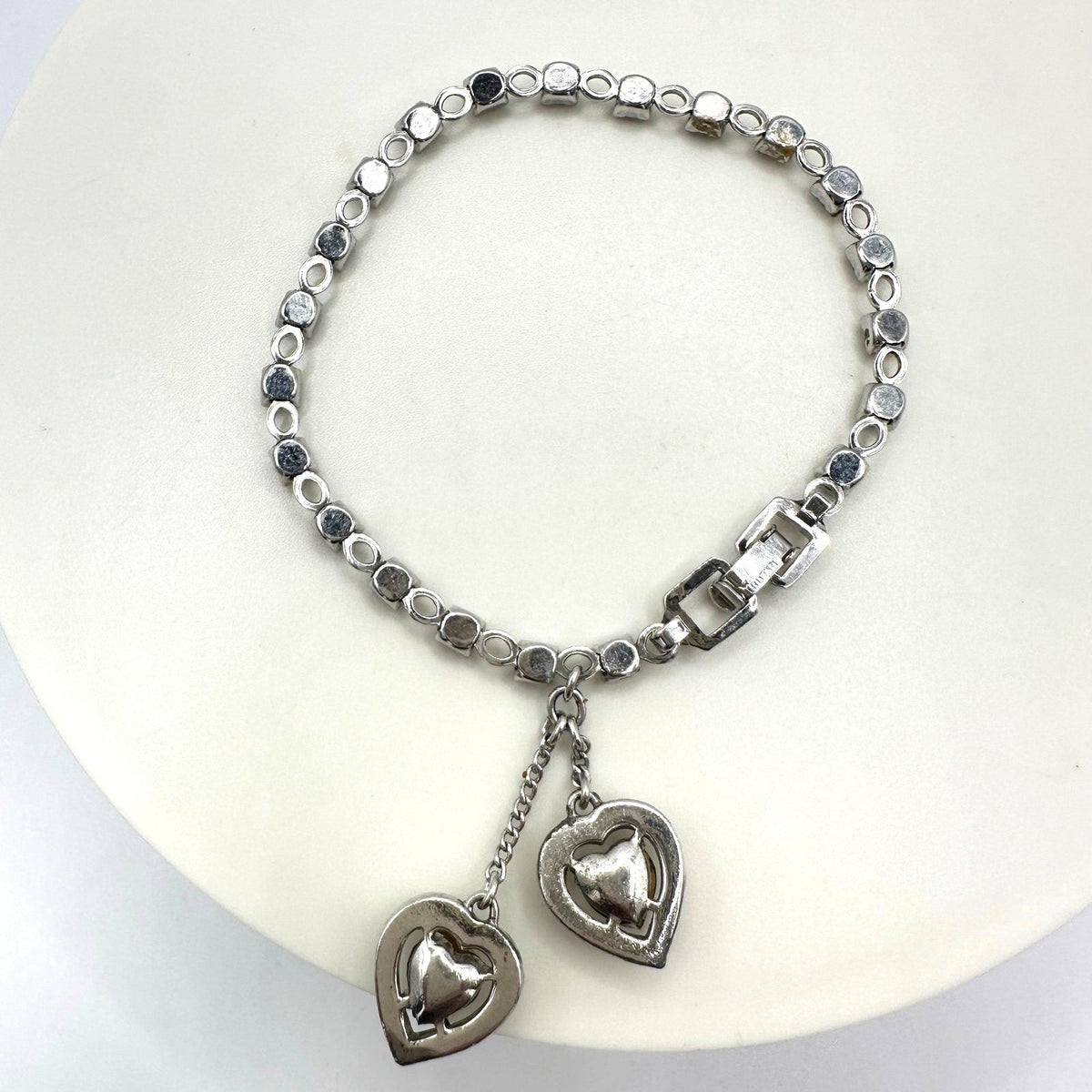 Crown Trifari silver tone rhinestones dangling hearts tennis 6.5" bracelet