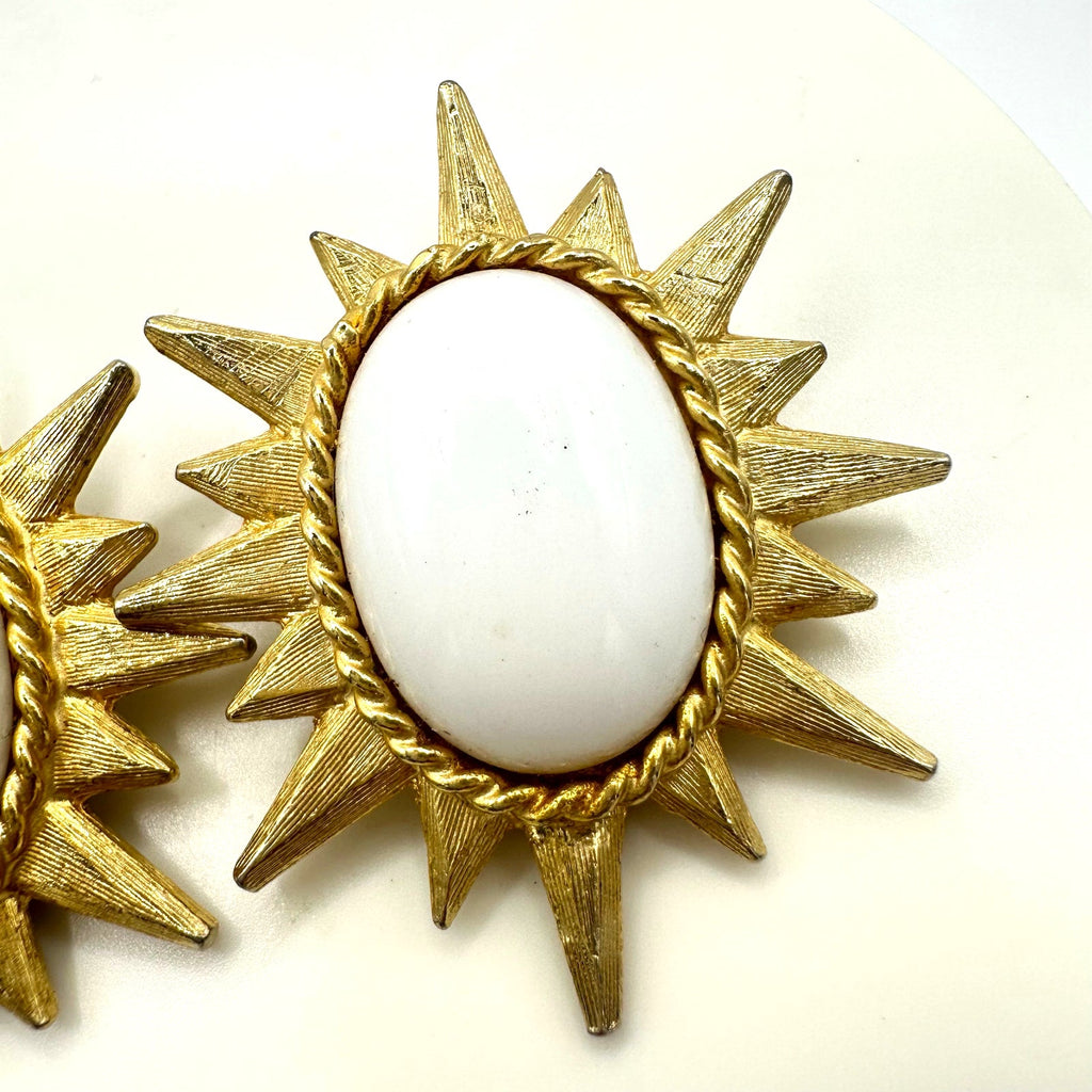 Vintage gold tone large starburst white milk glass cabochons clip on earrings