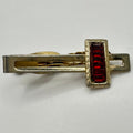 Vintage midcentury gold tone red molded glass baguettes rhinestone tie bar clip
