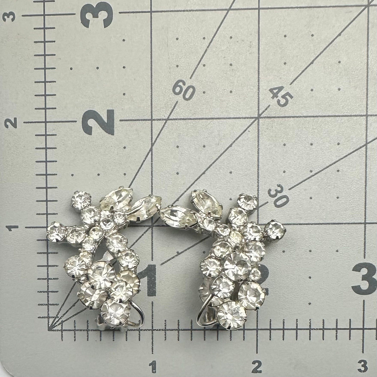 Vintage high end silver tone clear rhinestones wire over clip on earrings