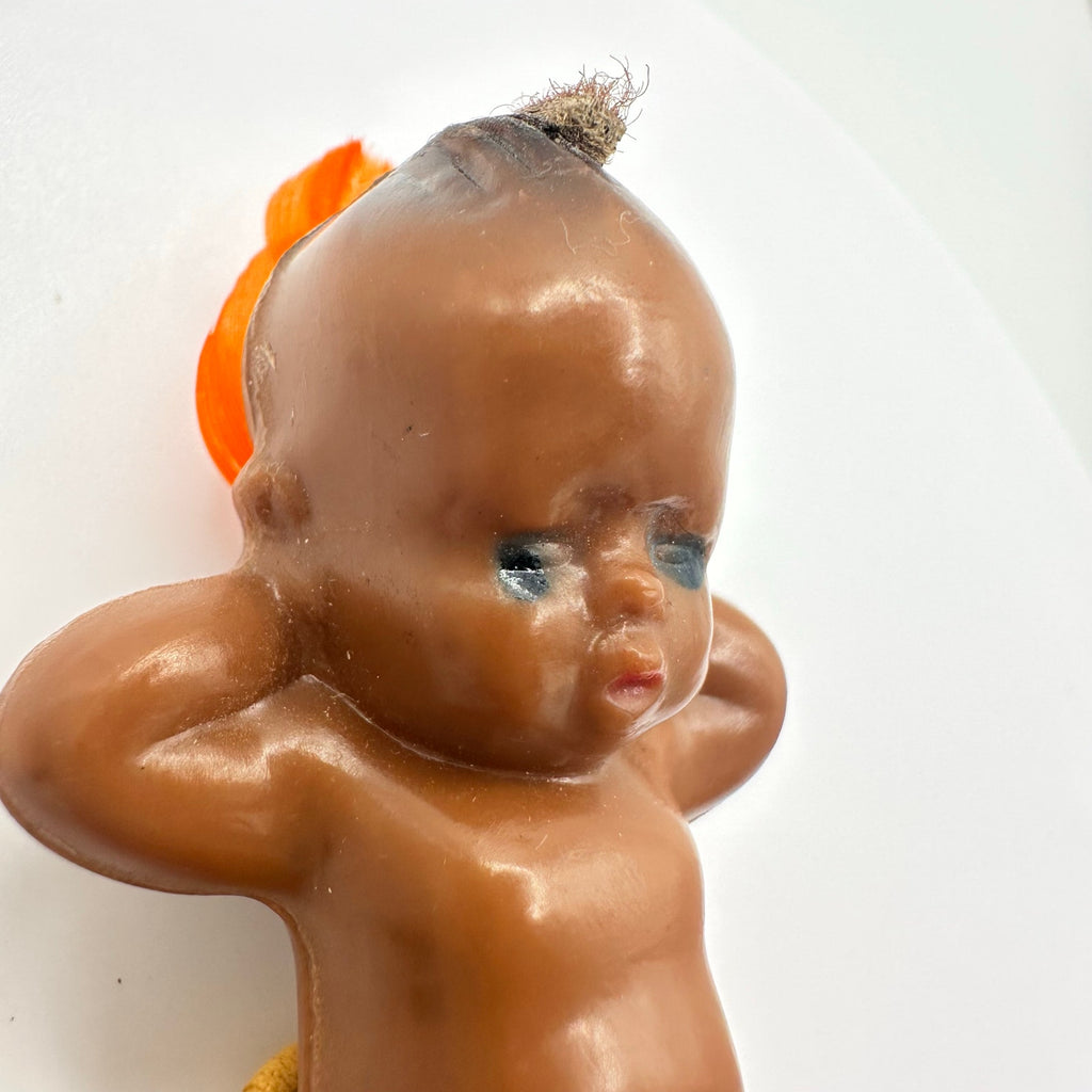 1940s vintage plastic Native American kewpie doll-style suede figural brooch
