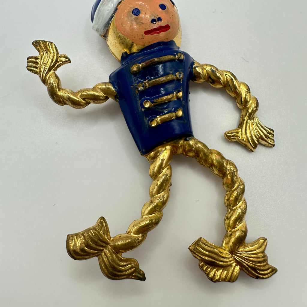 Antique Art Deco 1930s enamel brass boy bellhop Figural rope brooch pin
