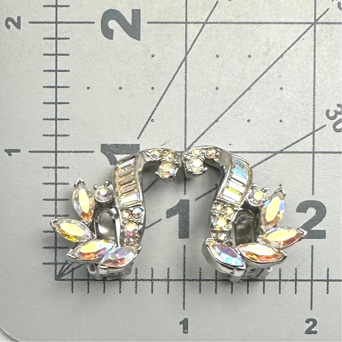 Vintage silver tone AB aurora borealis rhinestones scrolled clip on earrings