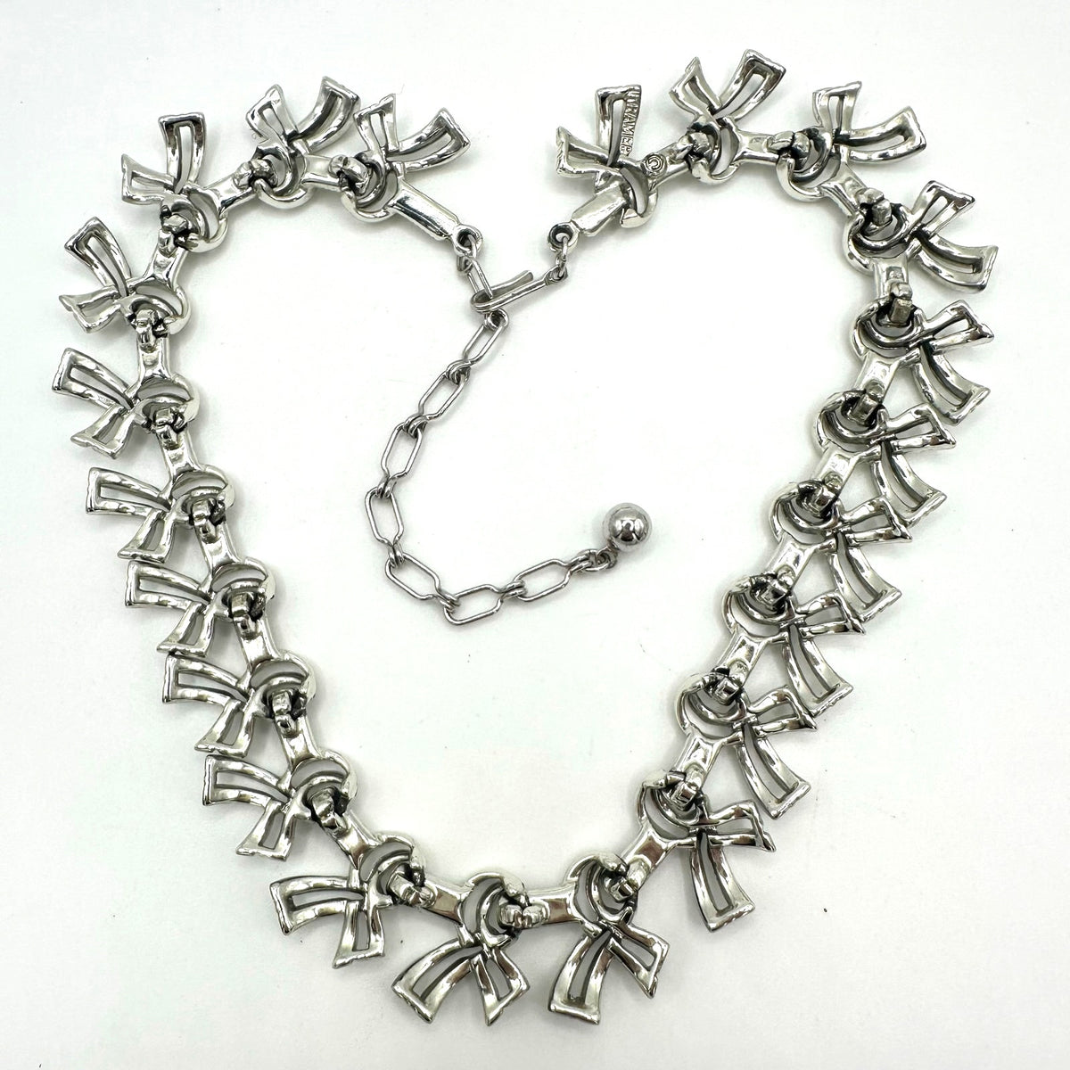 Kramer signed vintage silver tone rhodium plated bows ribbons chain 16” necklace