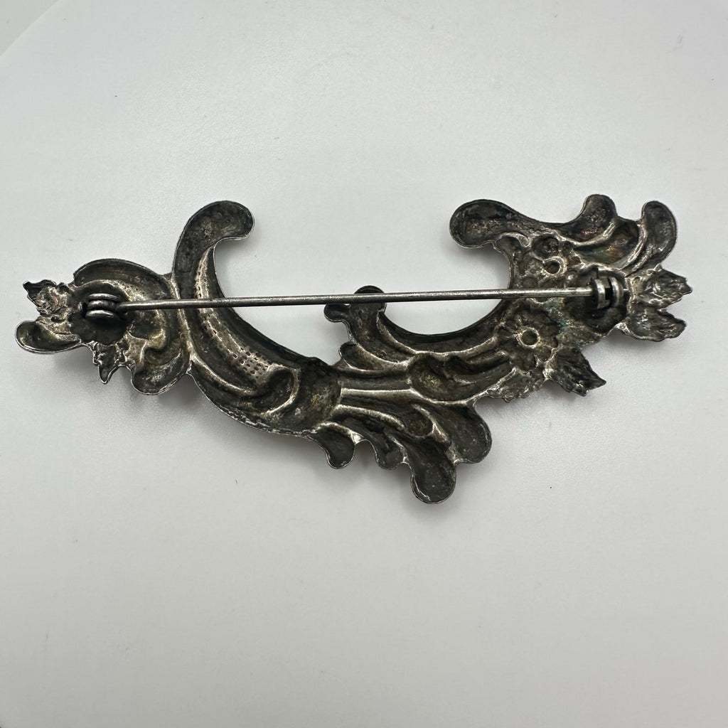 Vintage silver tone Art Nouveau Revival embossed scrollwork floral brooch
