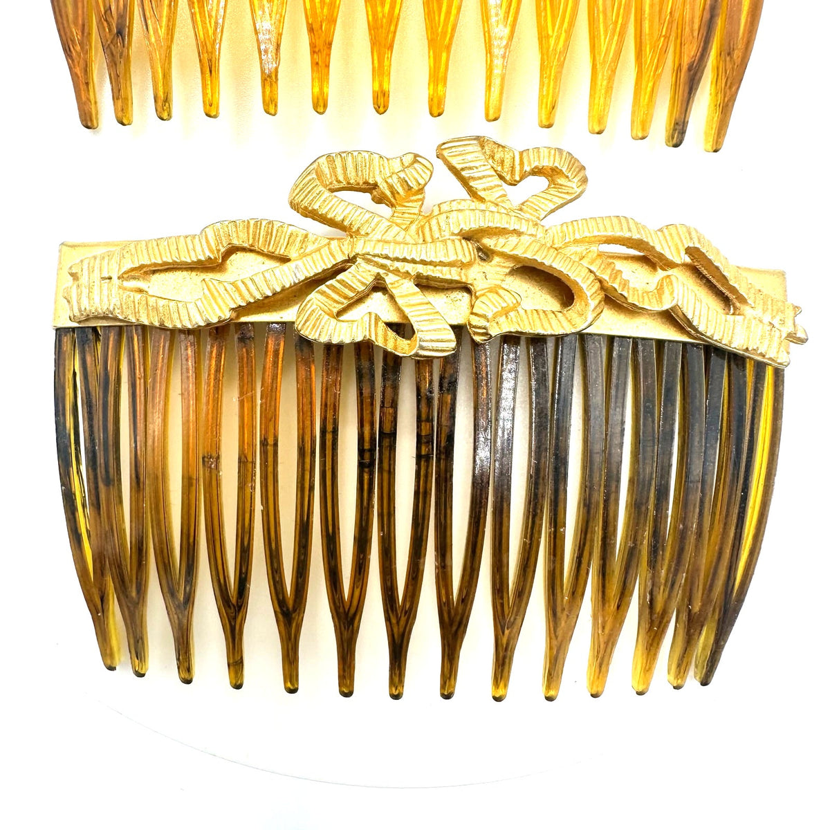 Kirks Folly set 2 gold tone ribbon bows faux tortoiseshell hair combs made USA