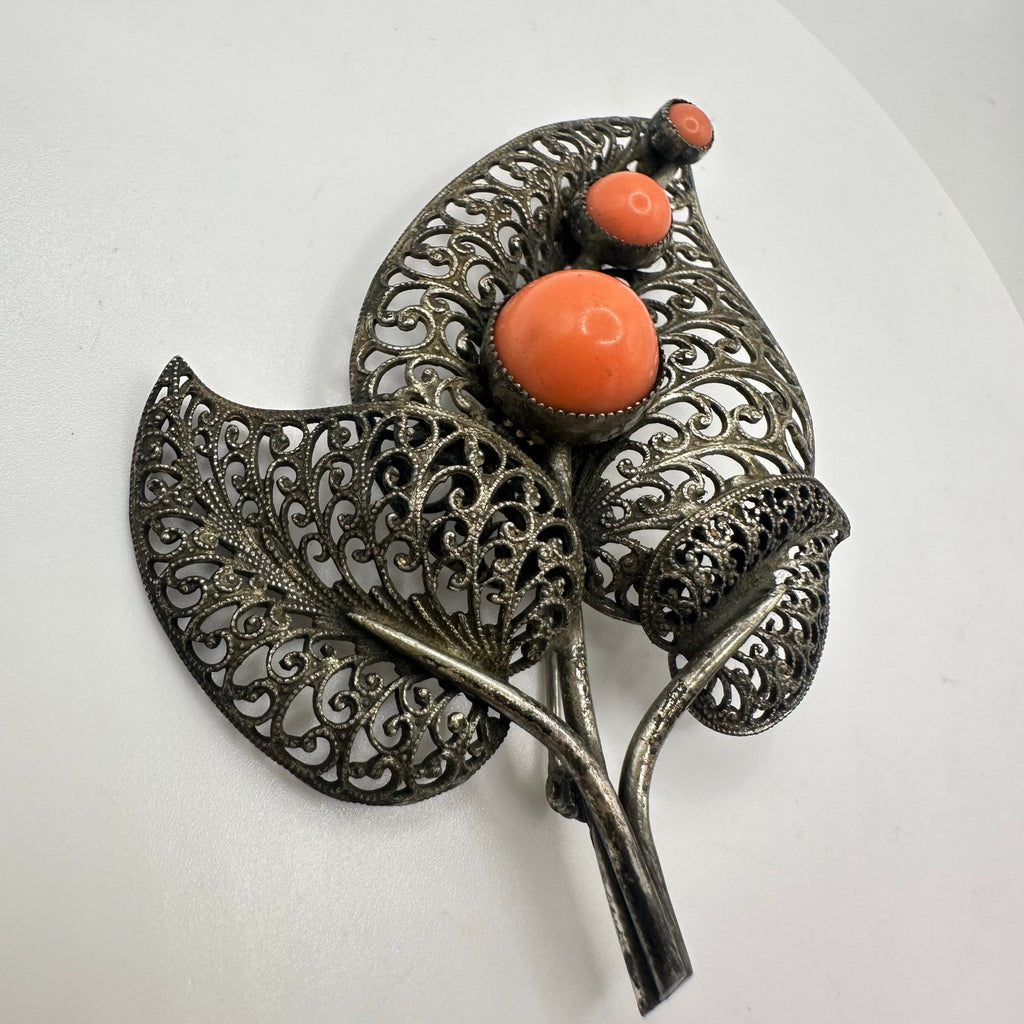Vintage intricate silver tone filigree leaves orange glass cabochons brooch pin