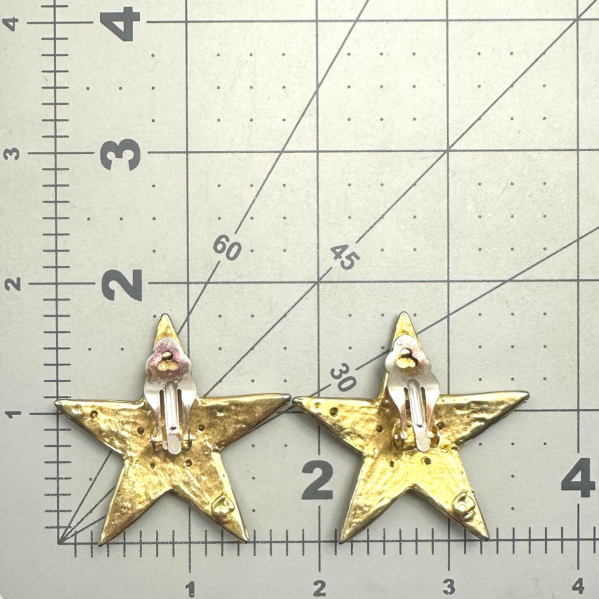 Vintage 1990s gold tone clear rhinestones 5 point stars clip on earrings