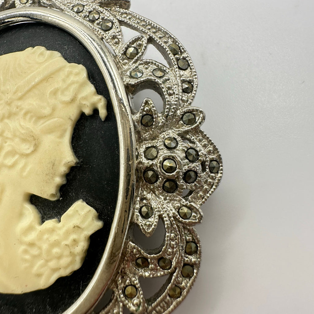 Silver tone rhodium plated genuine marcasite black white cameo brooch pendant