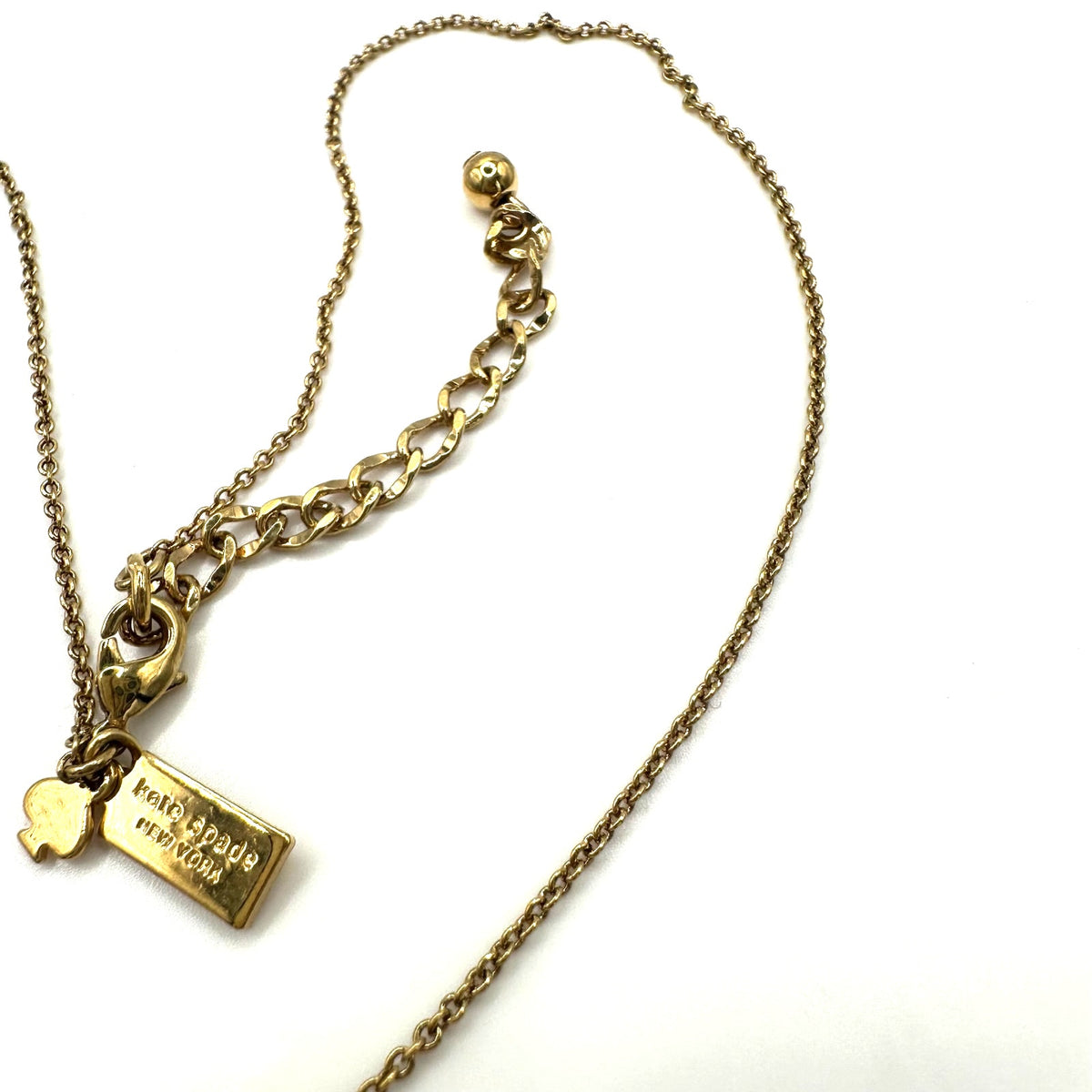 Kate Spade Cause a Stir gold plated opaque orange rhinestone pendant necklace