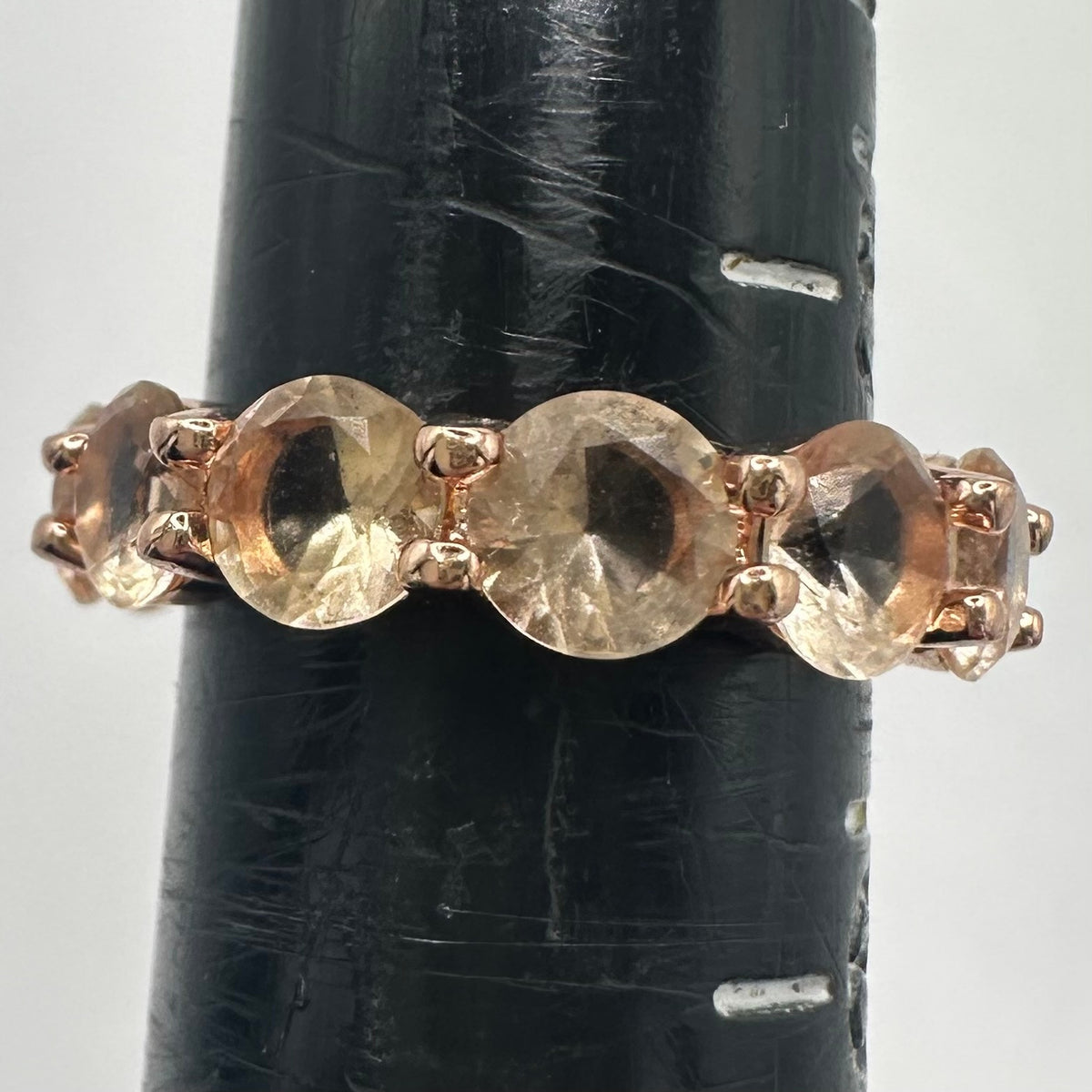 Rose gold tone peach champagne glass gemstones ring eternity band size 5.5